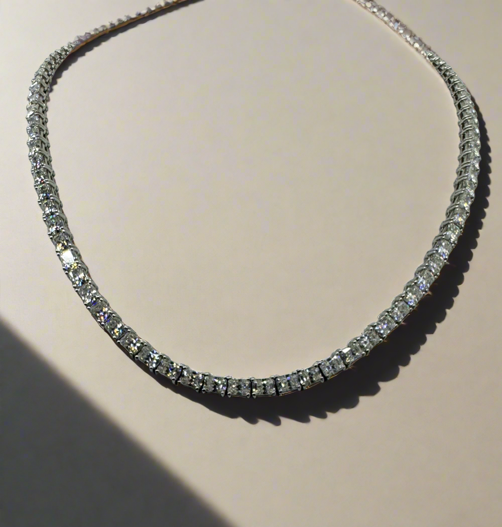 Diamond tennis chain containing generic Lab Grown diamond simulant with radiant cut going all the way around the entire length of the chain