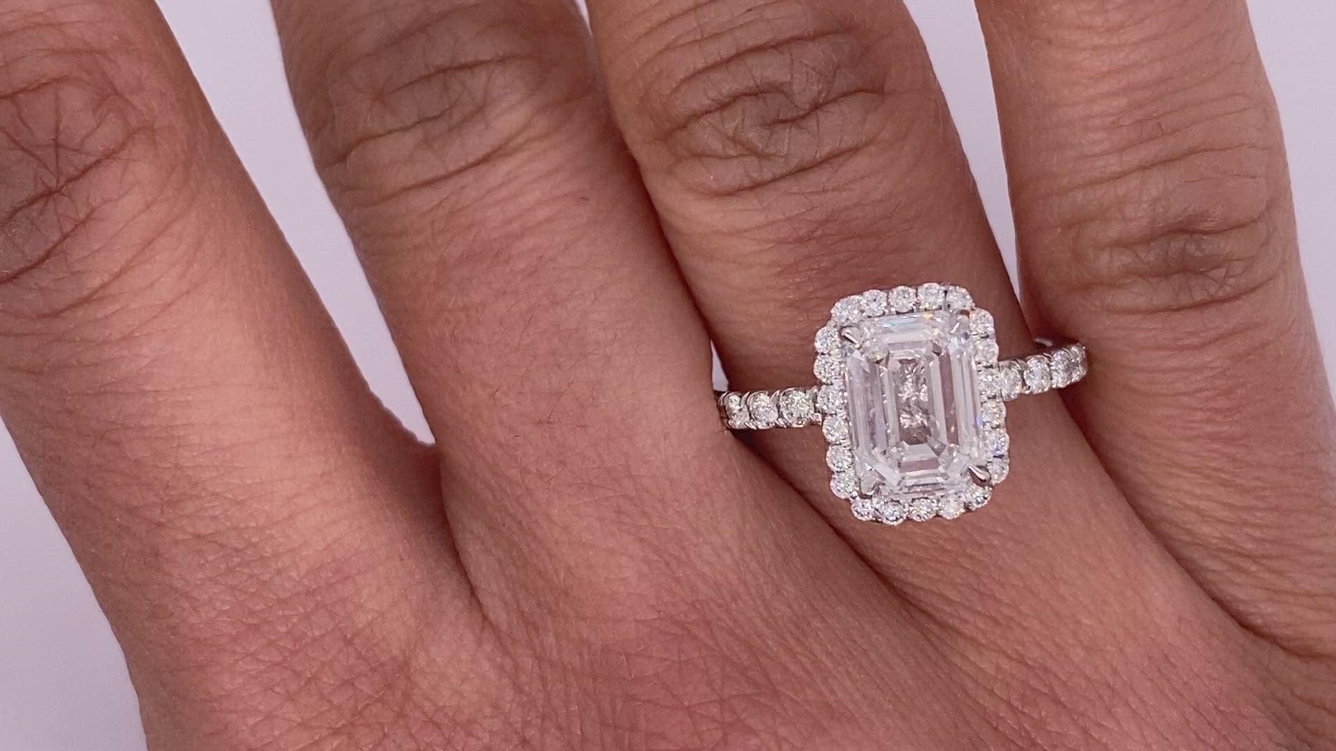 Diamond Ring Emerald Cut 3 Carat Halo Ring in Platinum Video on Hand