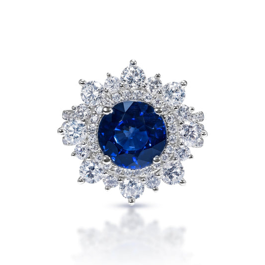 Evie 7 Carats Round Brilliant Blue Sapphire Ring in 18k White Gold Front View