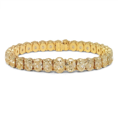 Yellow Diamond Bracelet Oval Cut 24 Carat Inline Tennis Bracelet in 18K  Yellow Gold Front View