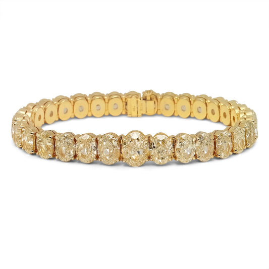 Yellow Diamond Bracelet Oval Cut 24 Carat Inline Tennis Bracelet in 18K  Yellow Gold Front View