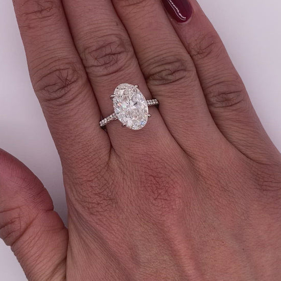 Diamond Ring Oval Cut 6 Carat Sidestone Ring in 18K White Gold Video on Hand