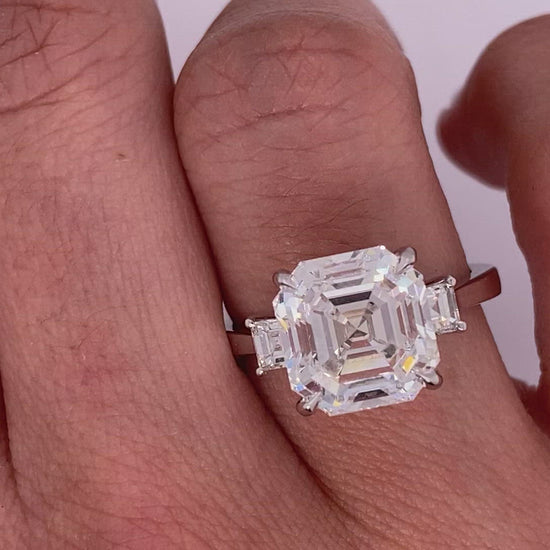 Diamond Ring Asscher Cut 5 Carat three stone ring in 18k White Gold Video on Hand